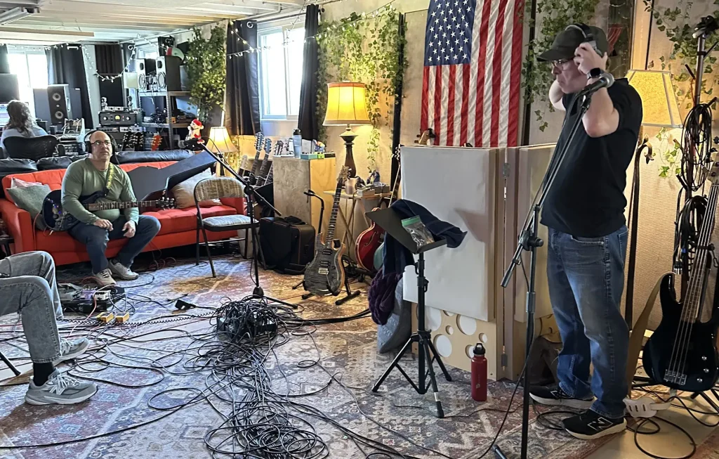 band members at recoding studio