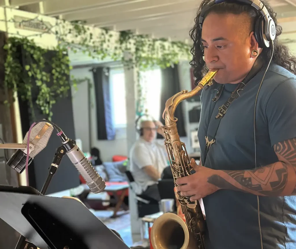 Armando playing the saxophone